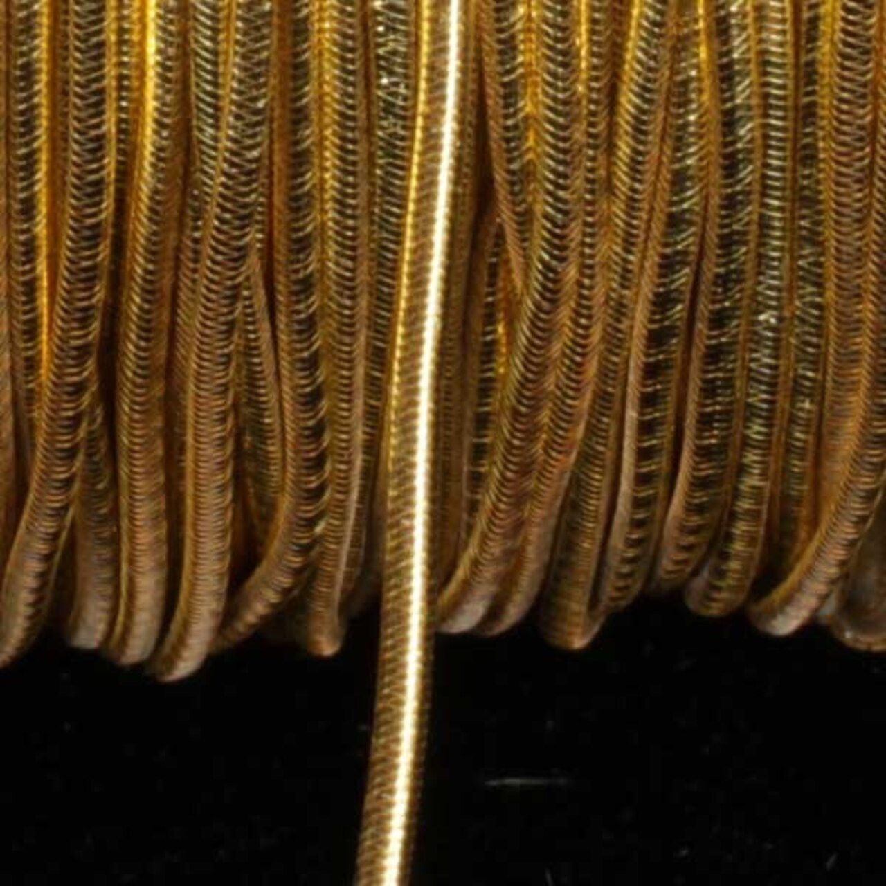 The Ribbon People Gold Braided Elastic Craft Cord 0.25" x 218 Yards